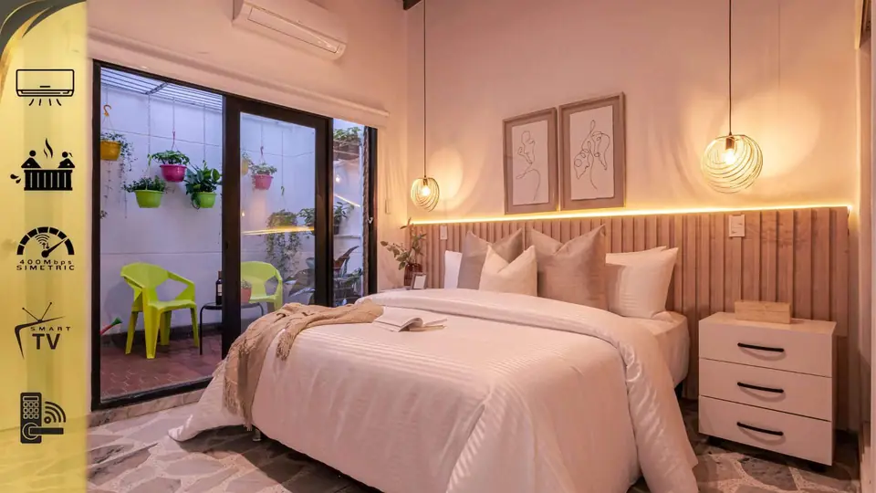 Master bedroom: queen bed, A/C, 58" smart TV, safe, ensuite bath and private terrace
