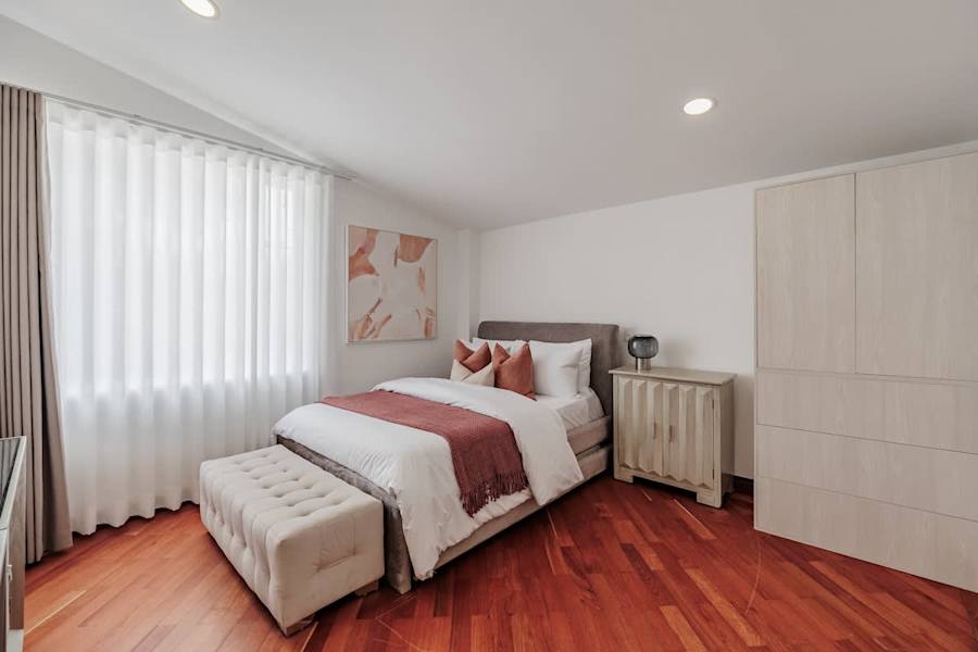 Family Suite # 4 – Elevated second sleeping area with a full bed on the mezzanine and a pull-out trundle bed, ideal for children, teens, or additional registered guests.